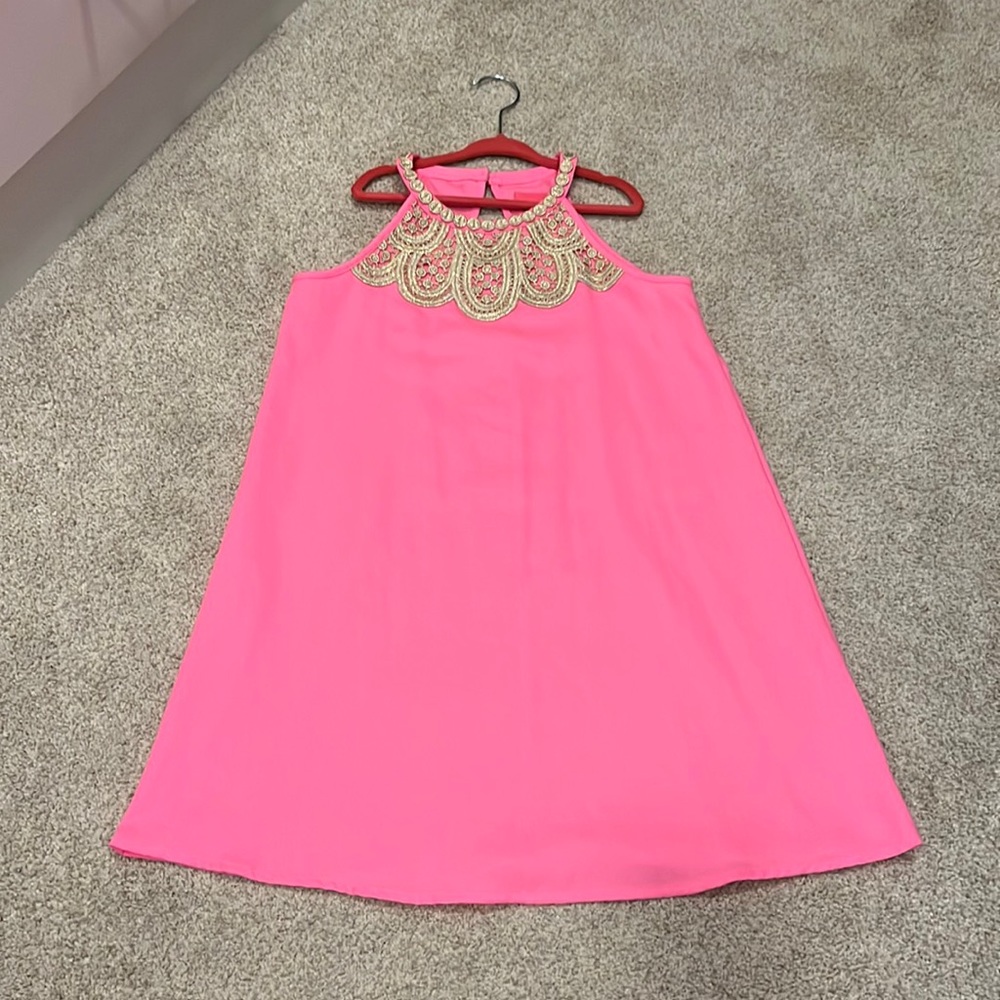 Lilly Pulitzer girls pink dress with gold trim.